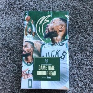 Dame Time bobble head